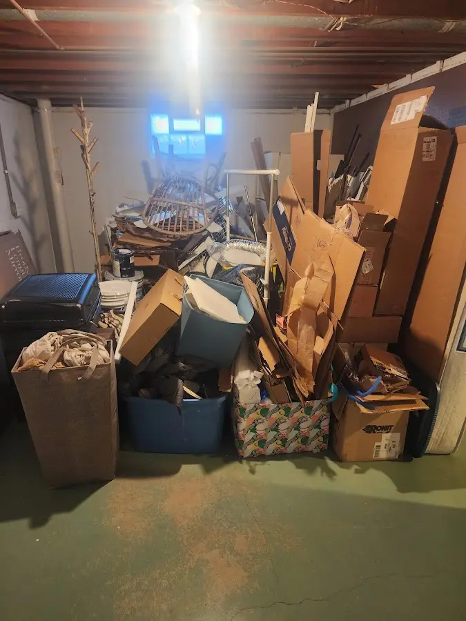 Roll-off dumpster container at job site for Construction Dumpster Rental in Hilton